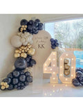 40 Birthday Balloons Setup, with black, white and golden balloons arch