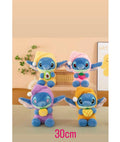 Set of four colorful plush toys resembling a character, with a '30cm' label on a neutral background.