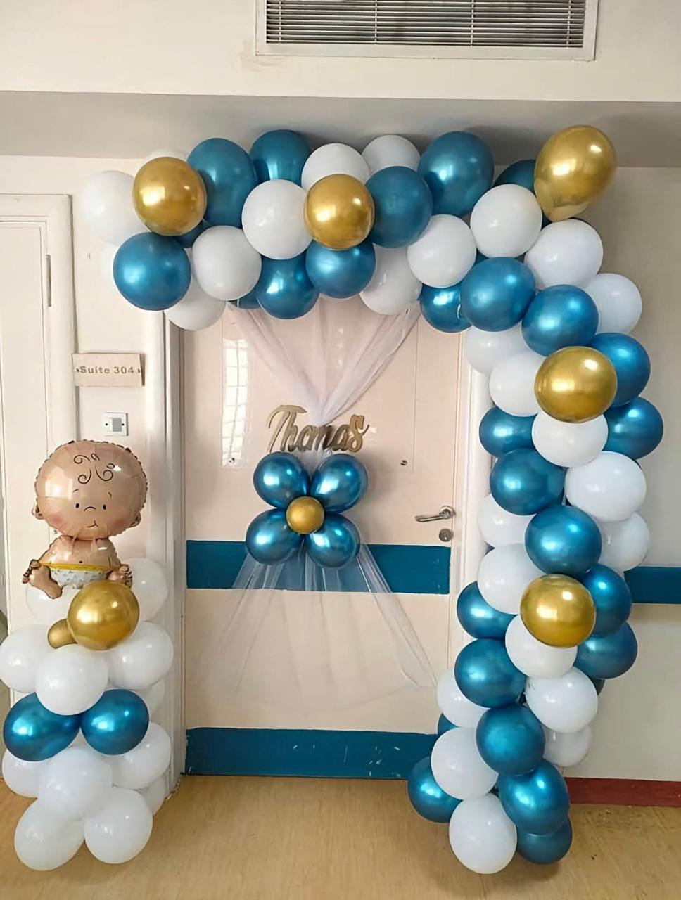 Blue, White and Gold Balloons Setup for new born baby in Dubai